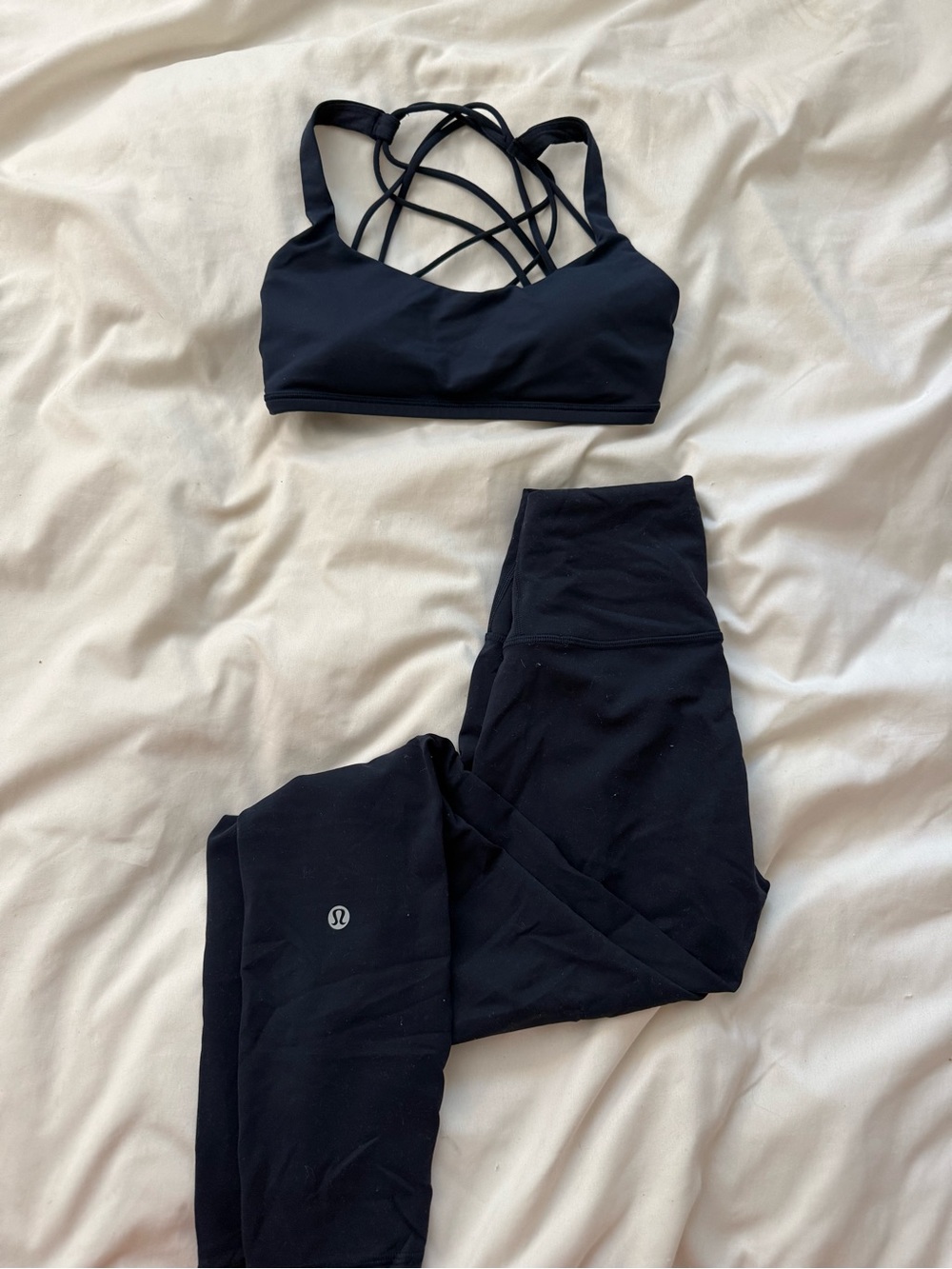 lululemon Wunder Train navy leggings with matching navy strappy sports bra